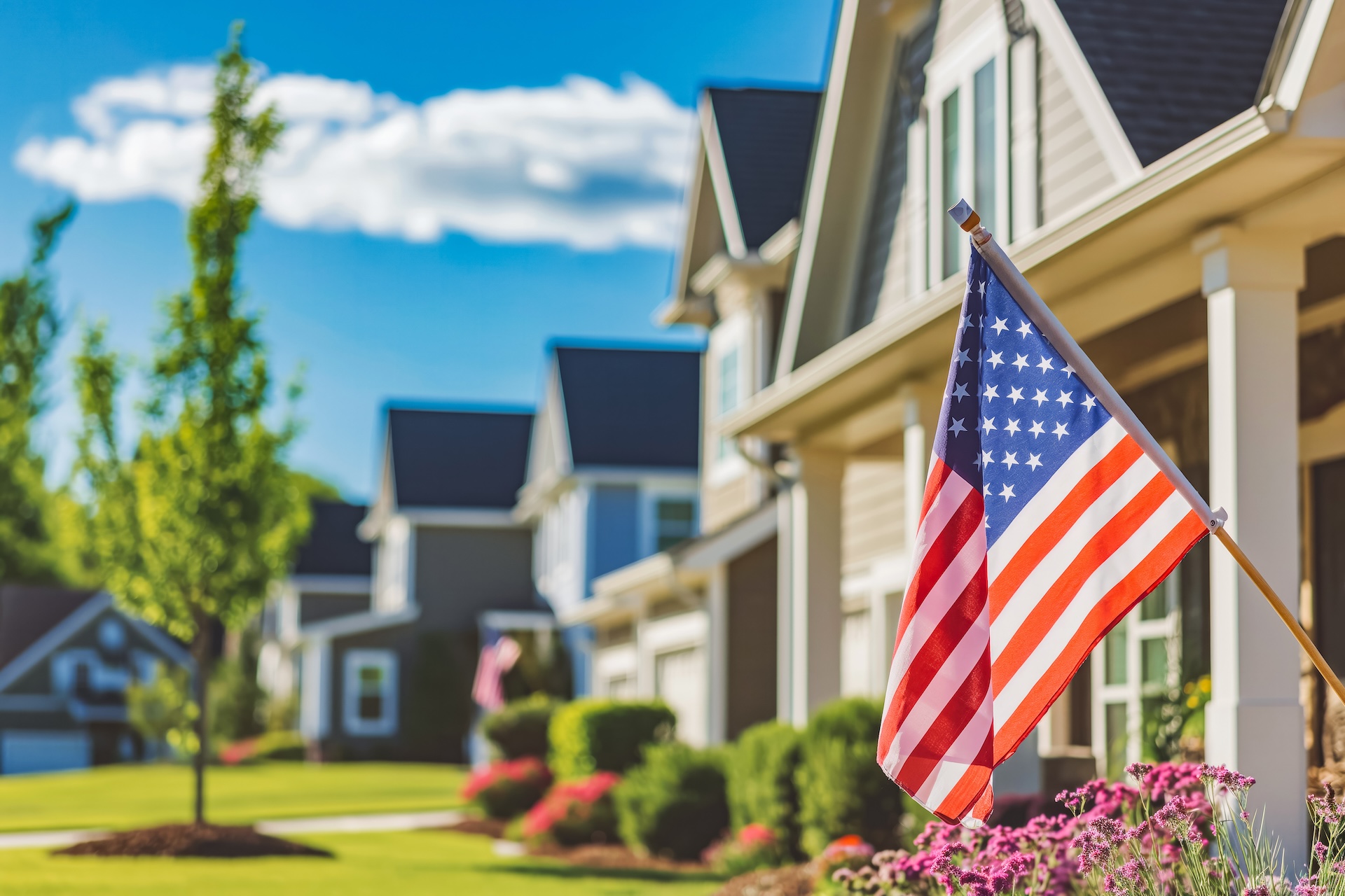 American Flag On A Modern American House. Memorial Day. The Flag Is Flown On A National Holiday.